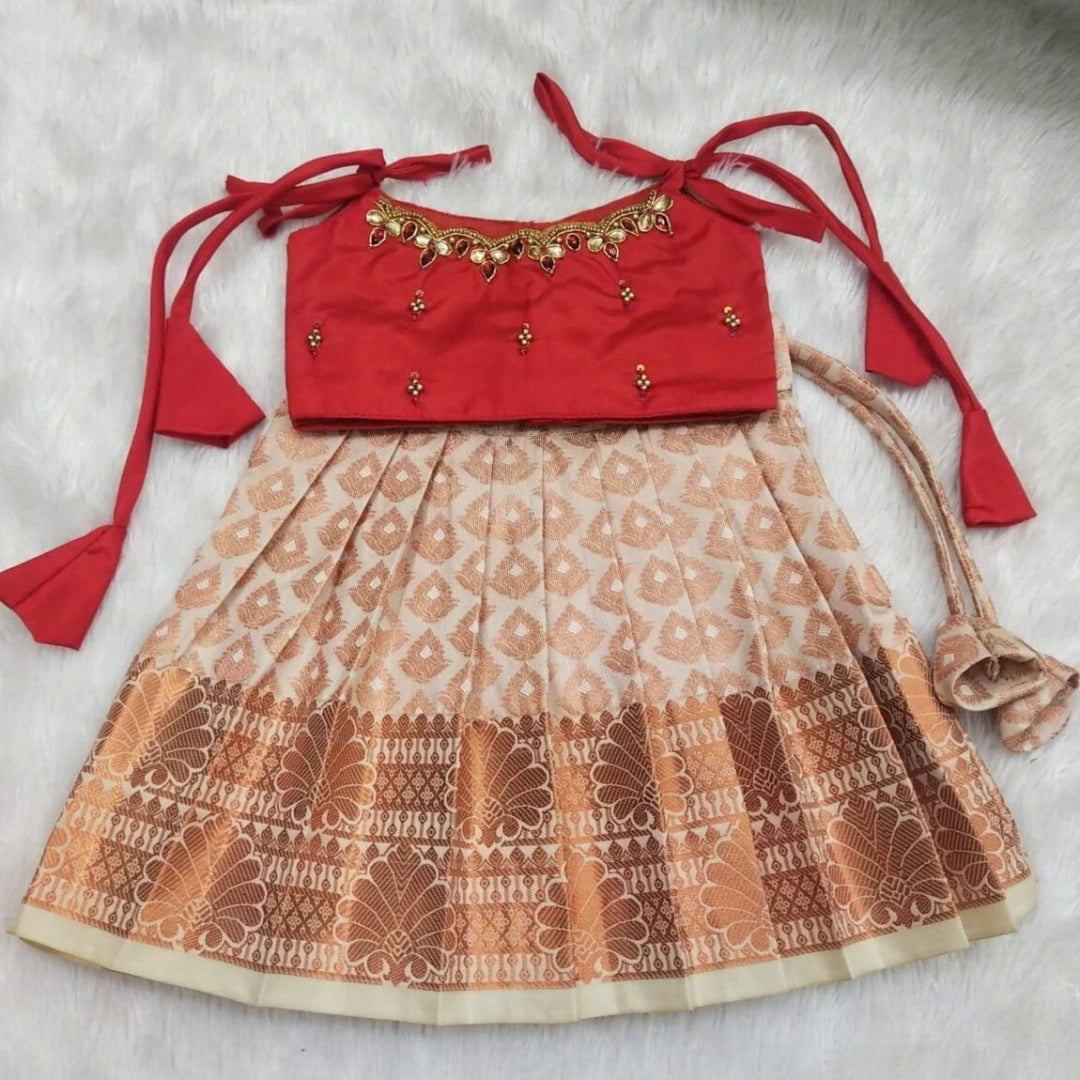 Kanchi Pattu Pavadai with Knotted Sleeves and Intricate Aari Work