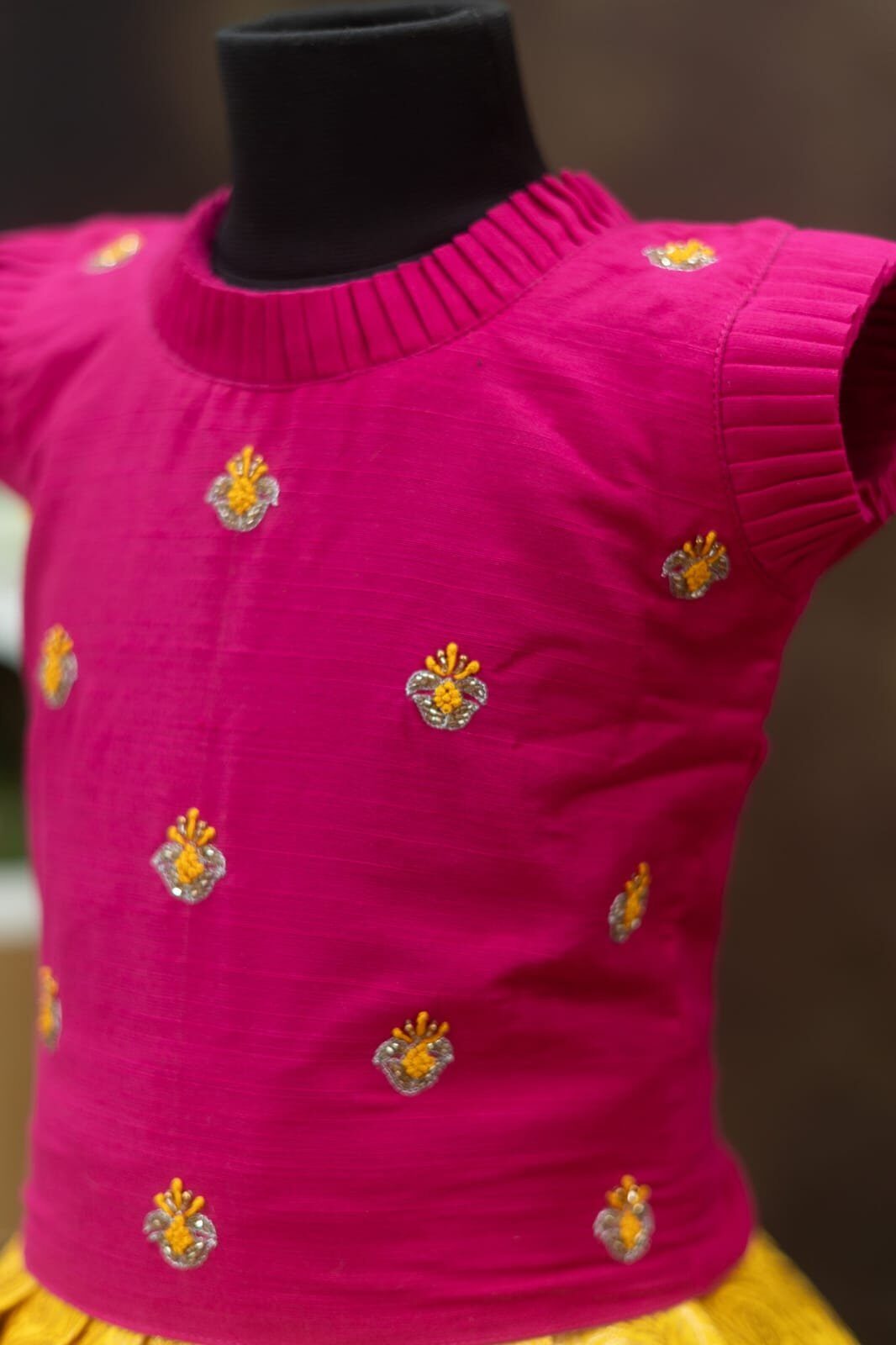 Semi Banarasi lehanga paired with a raw silk top.