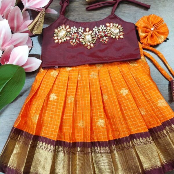 KANCHI PATTU PAVADAI WITH AARI WORK BLOUSE