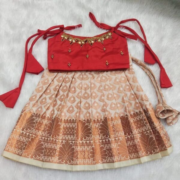 Kanchi Pattu Pavadai with Knotted Sleeves and Intricate Aari Work